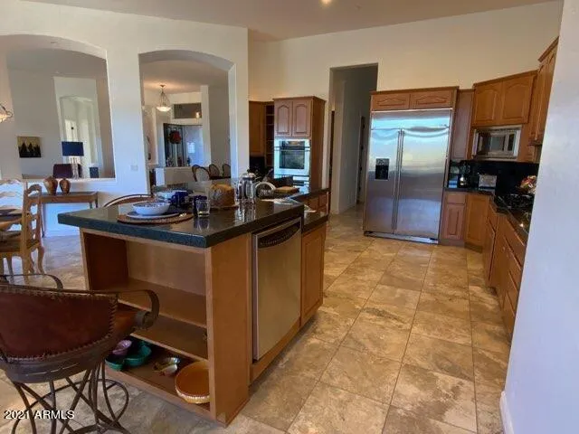 Chef's Kitchen with Granite Counters and Stainless Appliances!