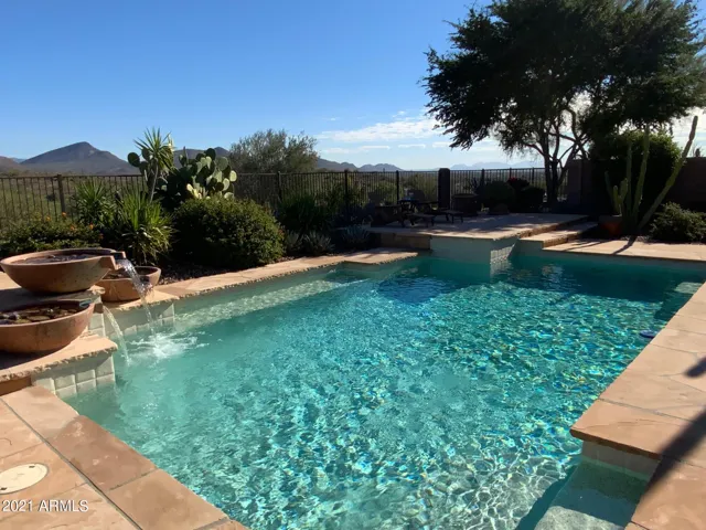 Heated PebbleTec Pool with Water Feature