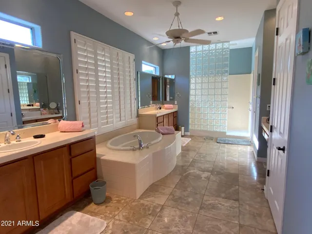 Primary Bath with Garden Tub, Dual Vanities, Walk-In Shower and Walk-In Closet
