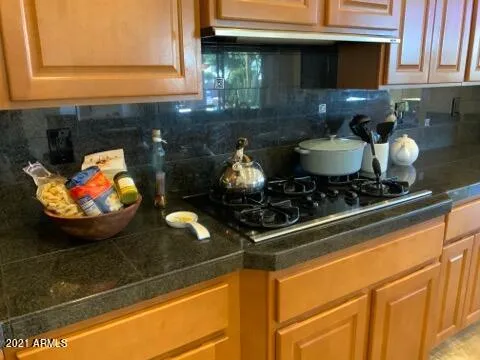 Kitchen with Gas Cooktop and Granite Counters