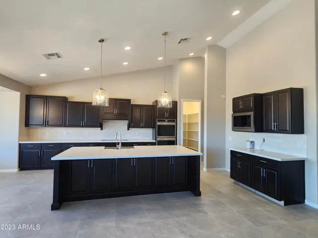 HUGE OPEN KITCHEN WITH ISLAND - ACTUAL PICTURE OF COMPLETED HOME
