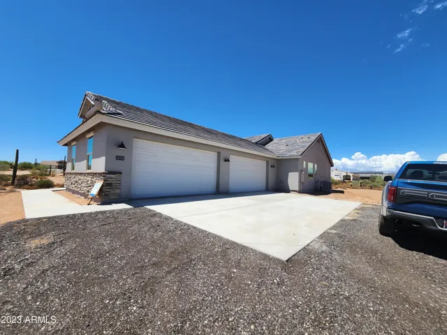4 CAR GARAGE - ACTUAL PICTURE OF COMPLETED HOME
