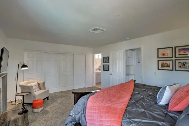 The master bedroom features a king bed and plenty of closet space.