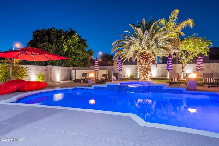 Resort Style backyard set up with Heated Pool and Spa!