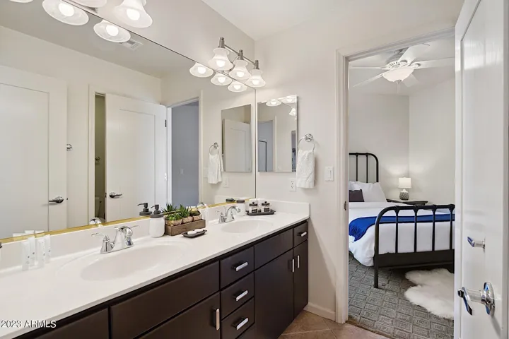 Second bathroom - Shared between the second and third bedrooms. Dual vanity, tub / shower combo.