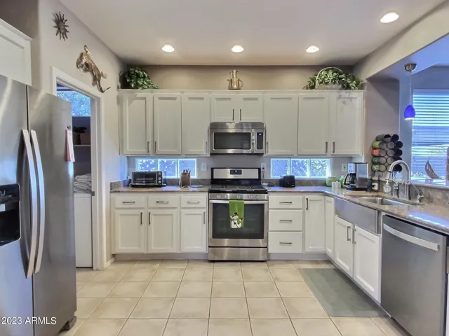 Updated Kitchen with Granite Counters and Stainless Steel Appliances