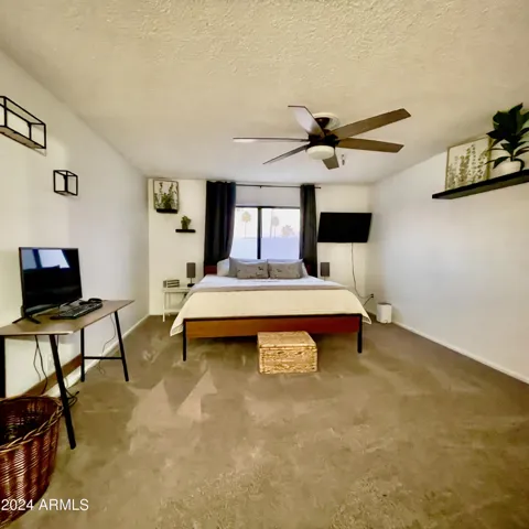 Features a king sized bed, Fire Tv, and private computer!