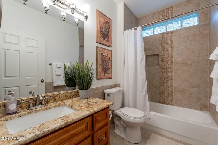 Upgraded w/Granite and Custom tiled shower/bathtub