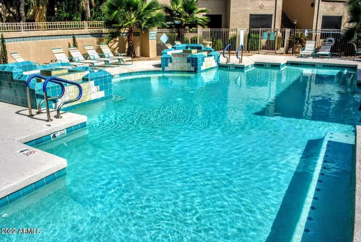 Swim laps in the heated pool