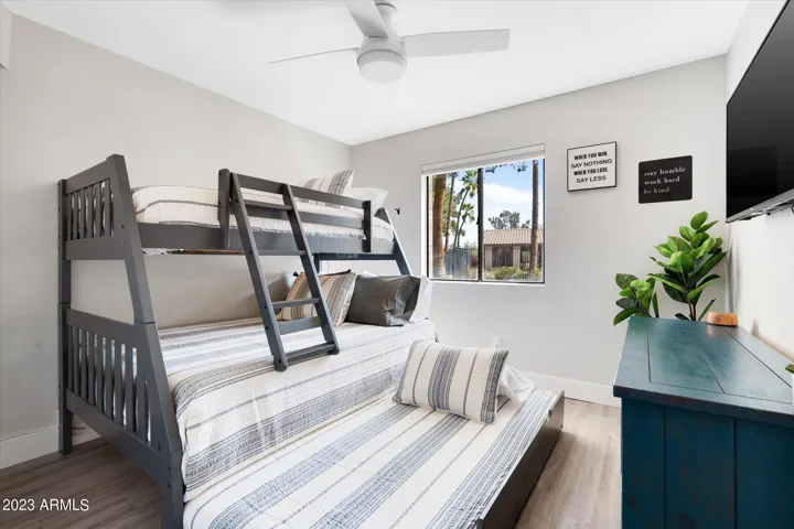 The second bedroom allows for a variety of uses with a bunk bed that includes a full-size bottom, a twin on top, and a twin trundle bed!
