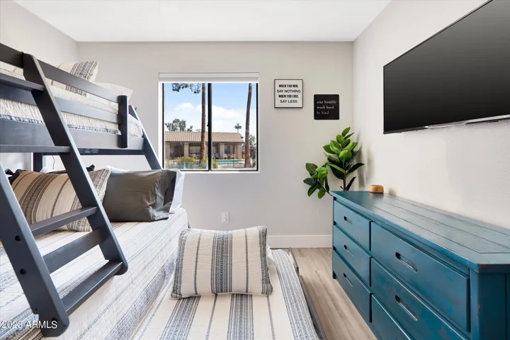 The second bedroom allows for a variety of uses with a bunk bed that includes a full-size bottom, a twin on top, and a twin trundle bed!