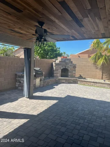 Beautiful paver covered patio with built-in Grill and Fireplace