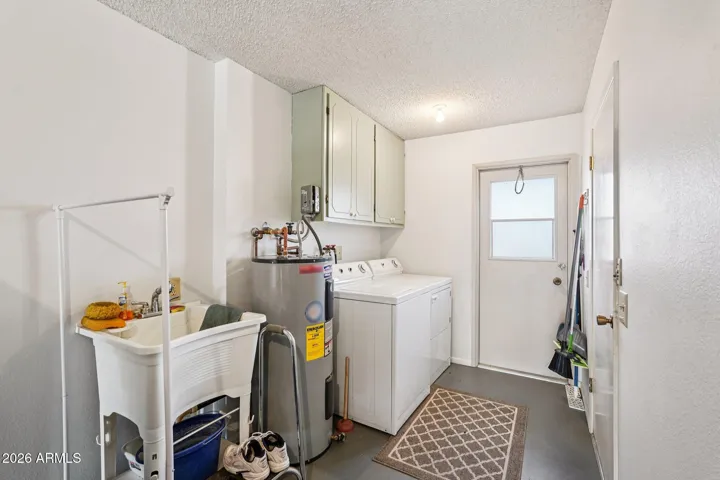Laundry with washer, dryer and utility sink