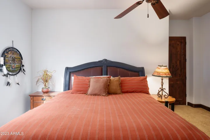 3rd bedroom with Queen bed, smart TV, and en-suite bathroom.