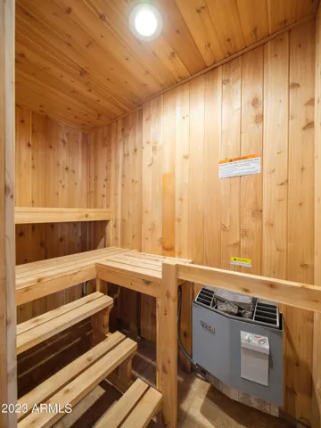 4th bedroom (inside guest casita): Features a King bed, fireplace, en-suite bathroom, and sauna!