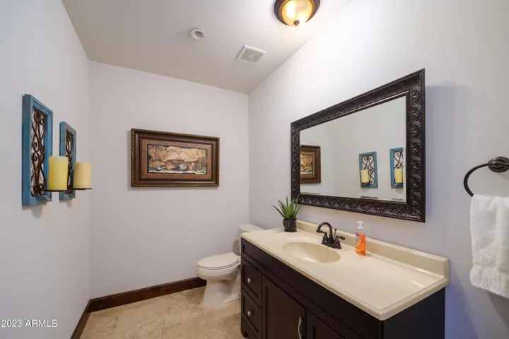 Half bathroom off of the kitchen area.
