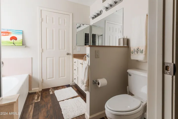 Double sinks, separate tub and shower