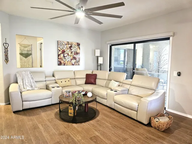 Comfy sectional & Sliding door to covered patio behind sectional