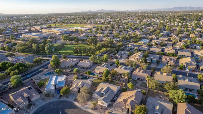 Drone view showing community park just 1 block away.