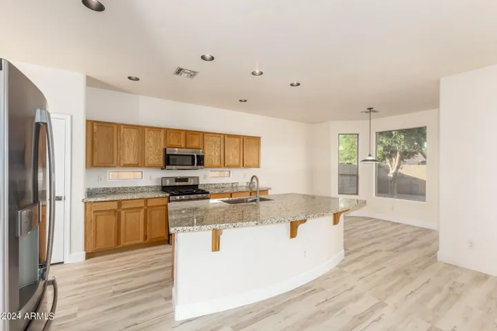 Kitchen has recessed lighting.