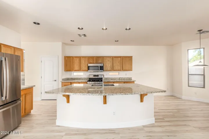 Large kitchen island overlooks great room.