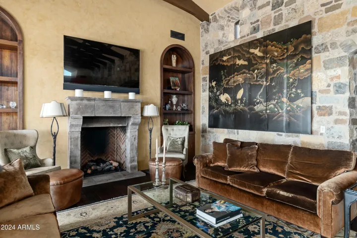 Grand Living Room with Fireplace and Floor to Ceiling Collapsible Patio Doors