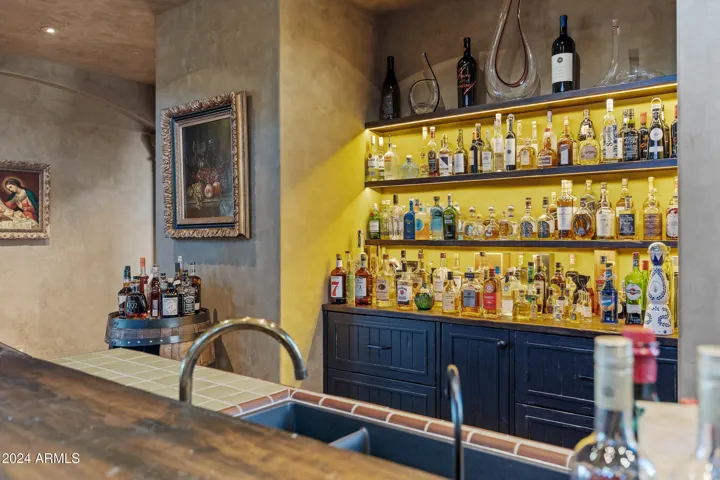 Whiskey Bar w/sink, fridge & freezers drawers, ice machine, and dishwasher.