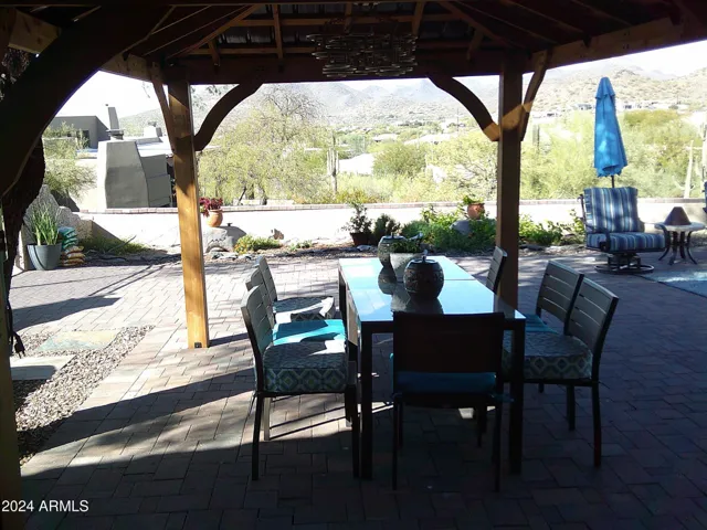 Backyard cabana with dining area