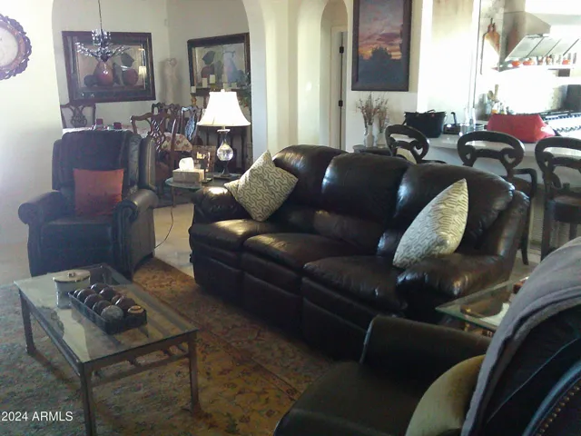 Great room is adjacent to formal dining room