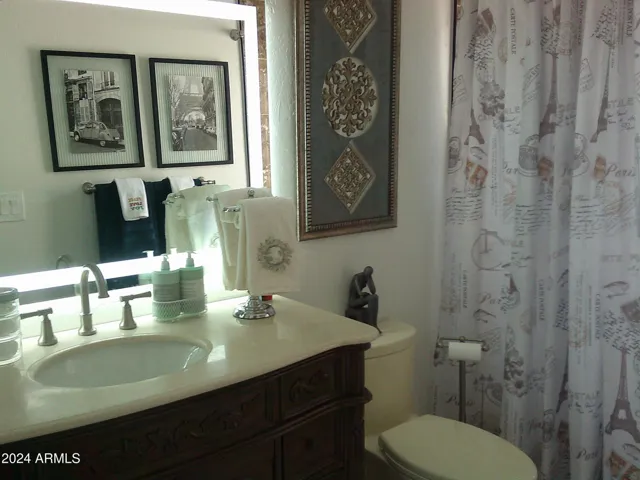 Full sized bathroom with soaking tub