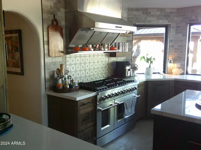 Gourmet kitchen with 48- inch FORNO gas range/oven