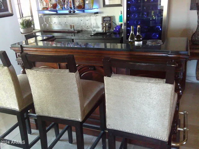 The wet-bar seats three