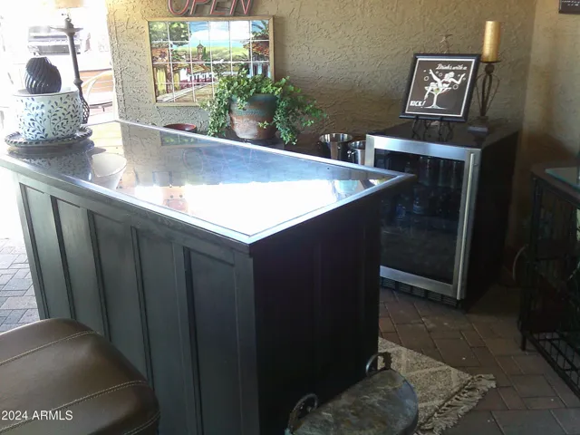 Patio has wine bar with refrigerator