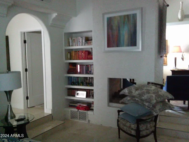 Built-in bookcases adorn the music room and the primary bedroom