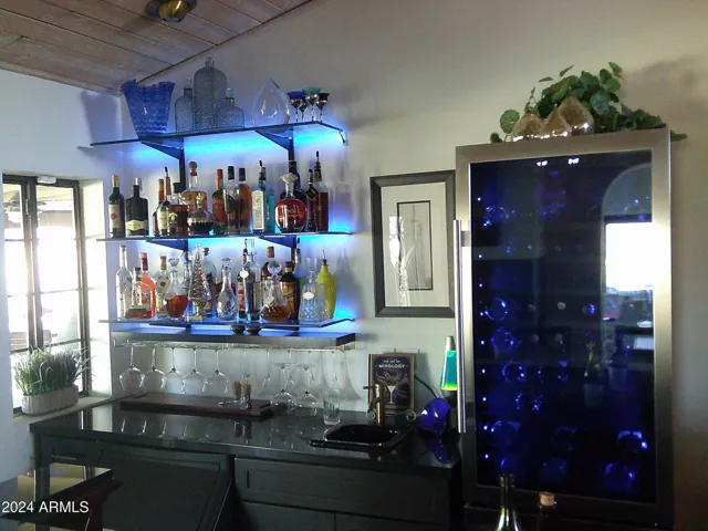 Large entertaining bar off great room and across from fireplace