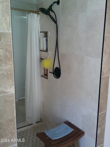 walk-thru shower in the wetroom portion of the primary bath