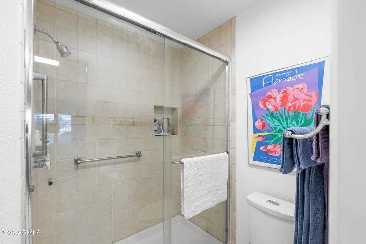 UPDATED SHOWER AND DUAL FLUSH TOILET