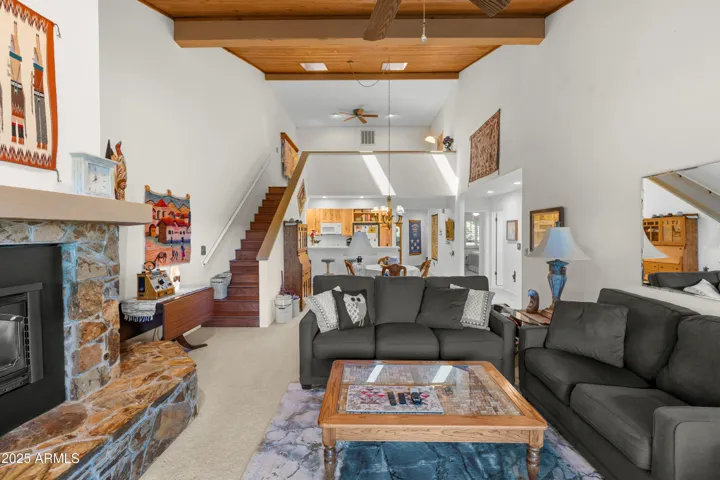 LIVING ROOM WITH VIEW OF LOFT