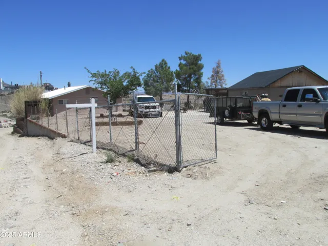 view of gate entry to property