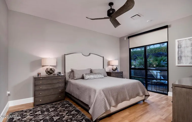 Spacious Owner's Suite overlooks lush Courtyard.