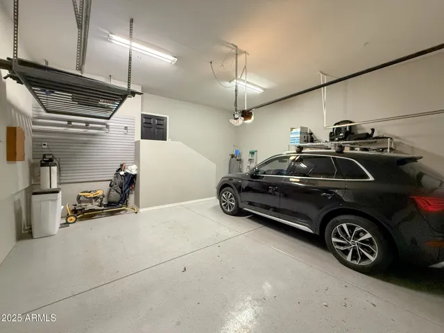 Extra space garage with lots of room for storage and high ceilings