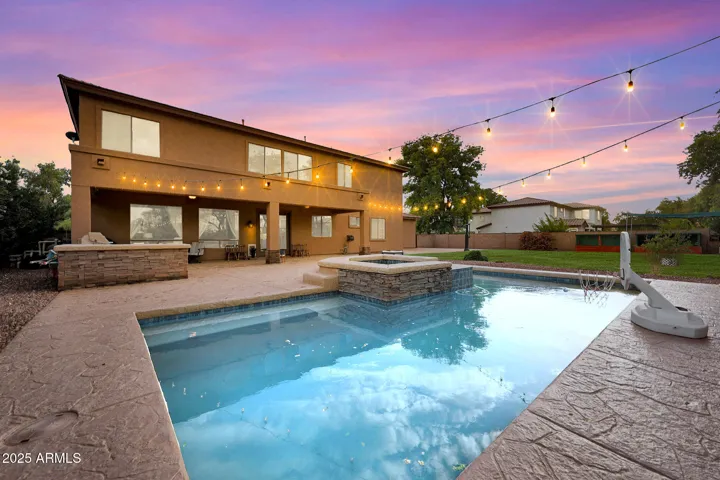 GREAT ENTERTAINING/ OR RELAXING AT SUNRISE AND SUNSET. POOL HAS BUILT IN SPA AND MISTER SYSTEM