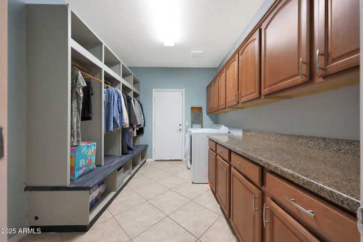sizable laundry room space, also has wet room organizer