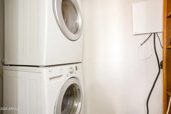 Laundry room in primary bedroom bathroom 1.