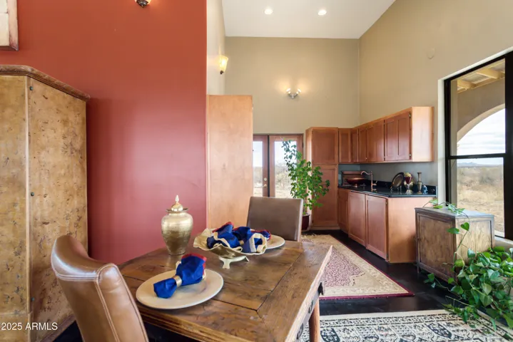 Dining area and sleek kitchenette.