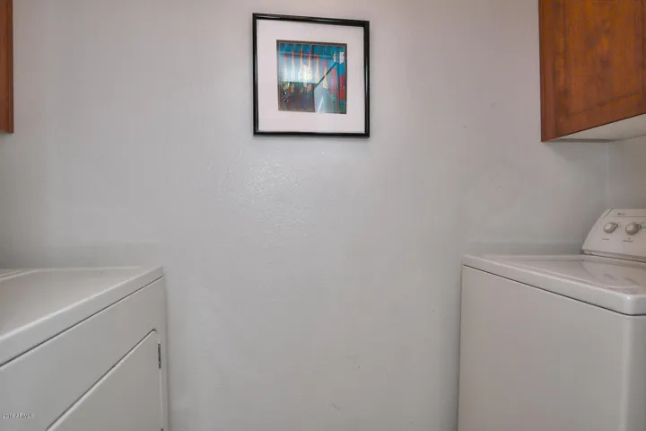Full size washer/dryer in laundry room