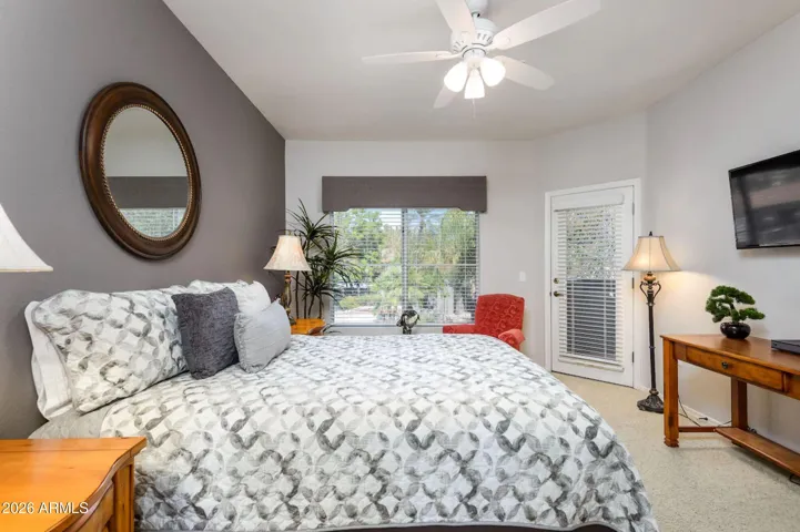 This is the larger room with balcony access, private ensuite bathroom, & spacious walk-in closet.