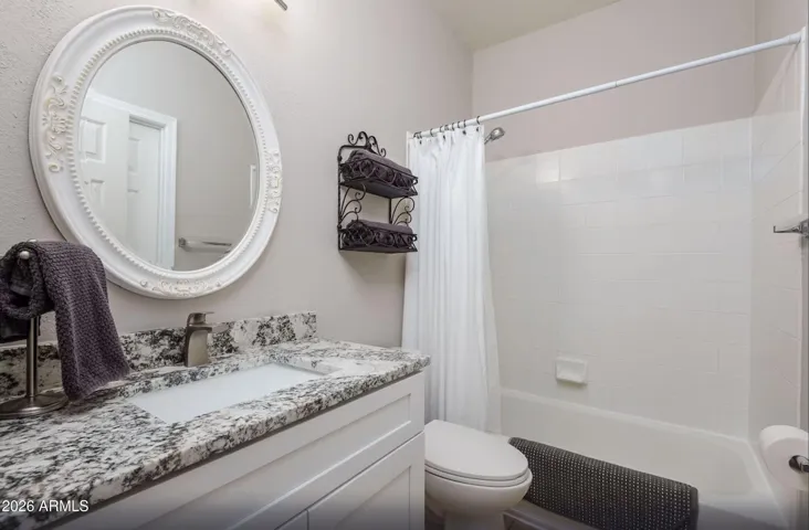 Access the 2nd bathroom from bedroom 2 or from the hallway for guests.