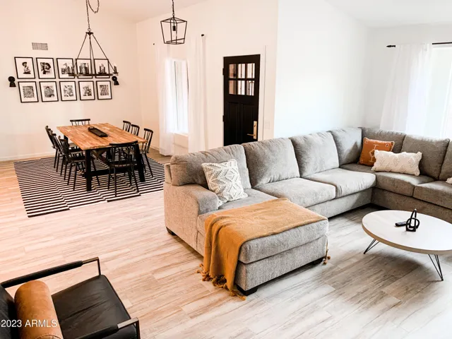 Front Family Room Open to Entry + Dining Room