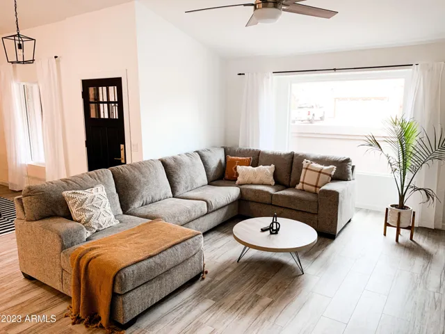 Front Family Room Open to Entry + Dining Room